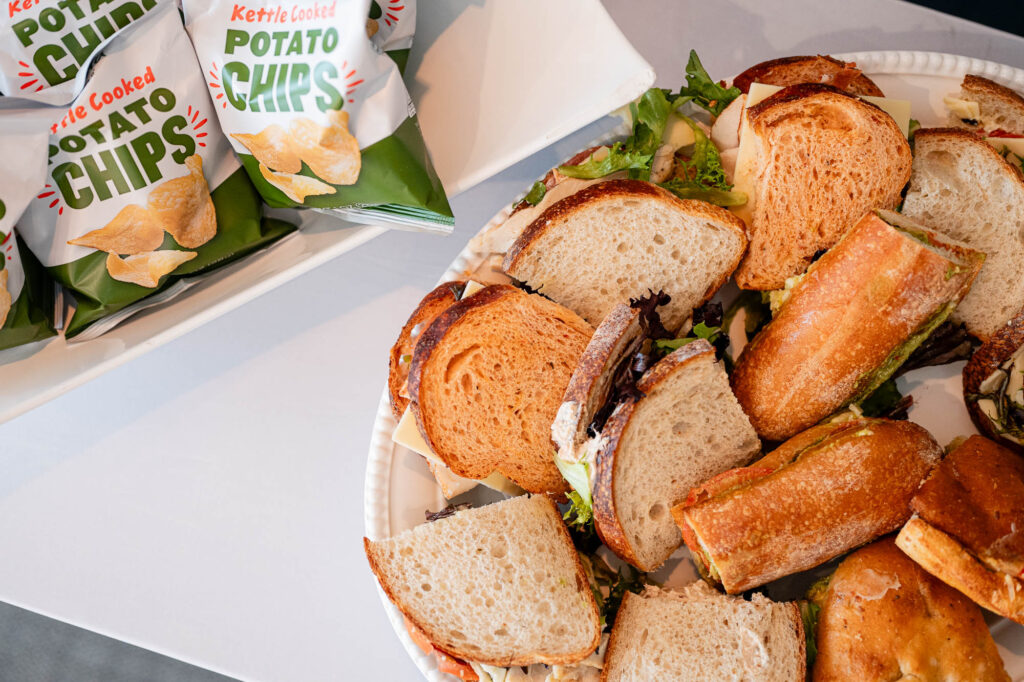 platter of sliced sandwiches with kettle cooked potato chip bags, Comfort Inn & Suites Logan International Airport